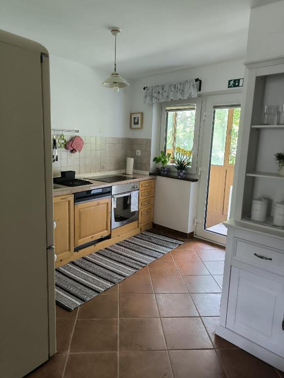Kuchyň nebo kuchyňský kout v ubytování Holiday Home Kristi