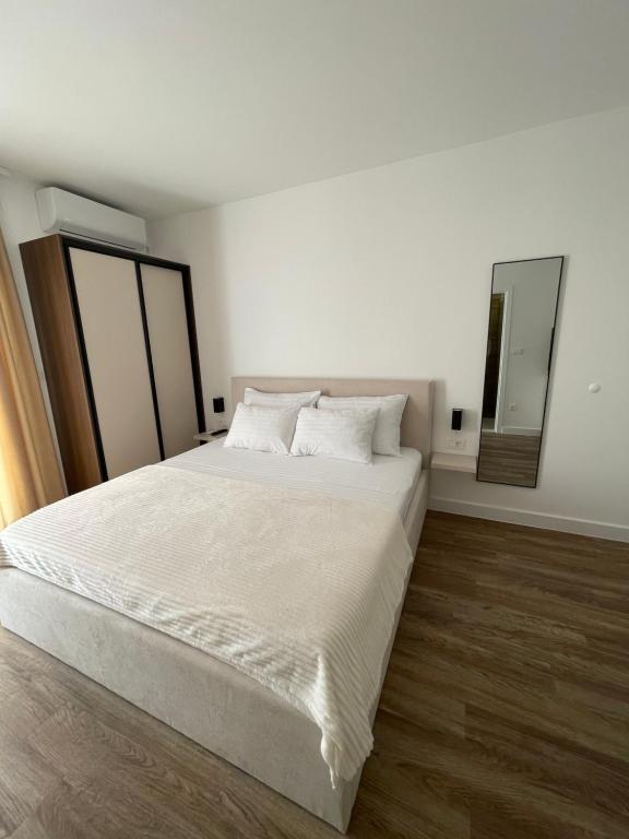 Postel nebo postele na pokoji v ubytování Apartments Njavro Neum