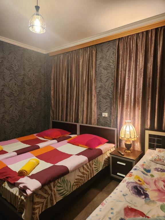 Postel nebo postele na pokoji v ubytování Guesthouse Vashlovani