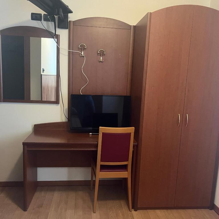 TV a/nebo společenská místnost v ubytování Ristorante Albergo Wada