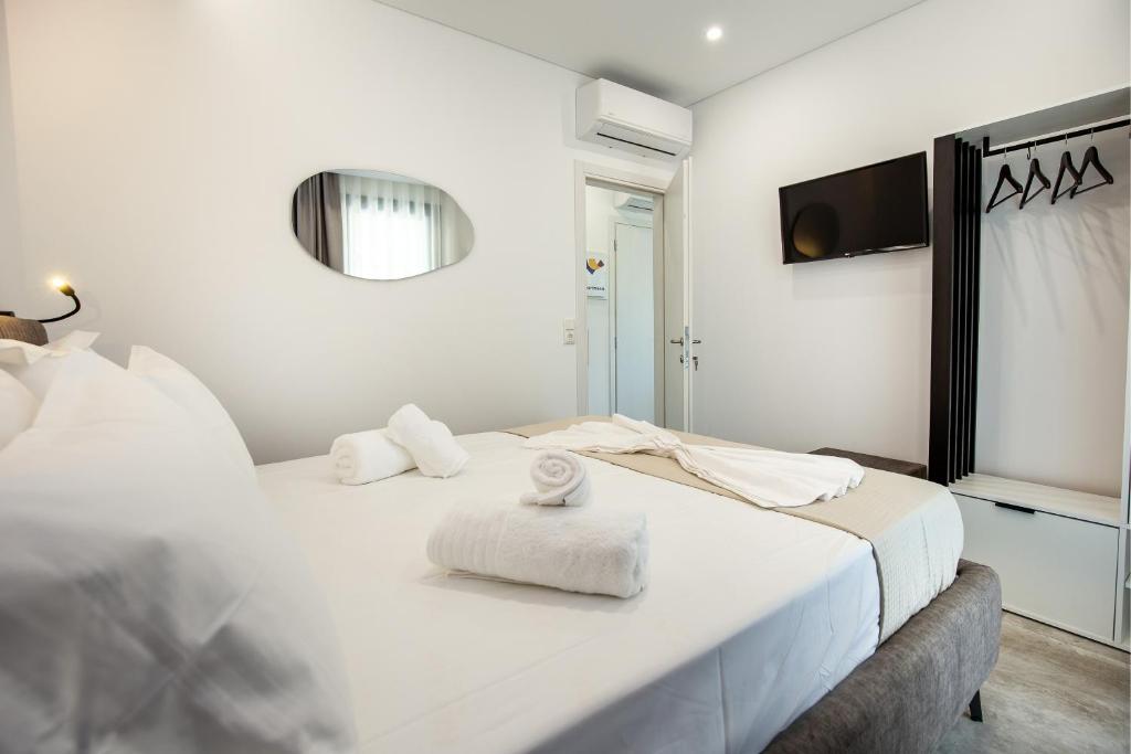 Postel nebo postele na pokoji v ubytování UpArtments