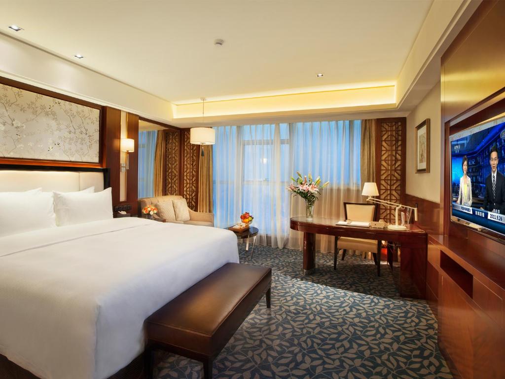 TV a/nebo společenská místnost v ubytování C&D Hotel Quanzhou