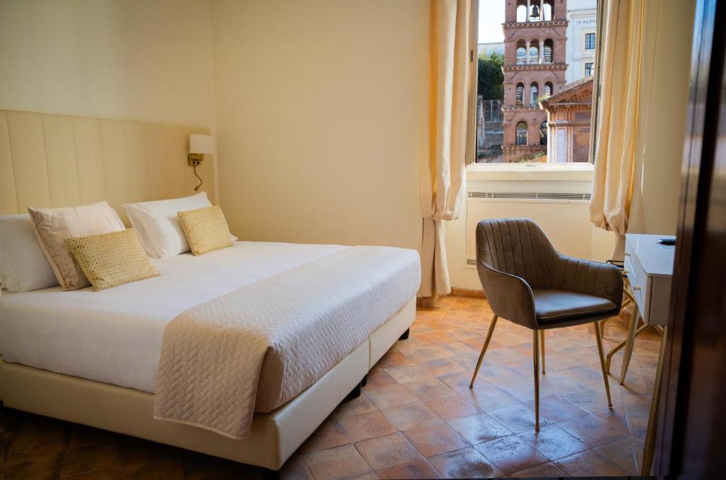Postel nebo postele na pokoji v ubytování Basilica Hotel
