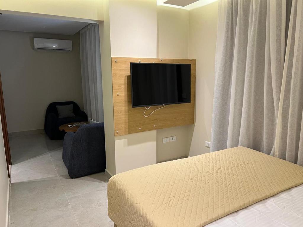 TV a/nebo společenská místnost v ubytování Sun gate house