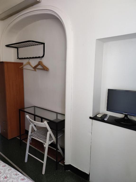Postel nebo postele na pokoji v ubytování Hotel Caffaro