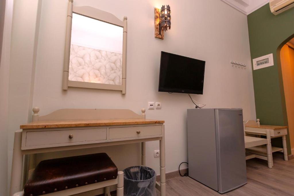TV a/nebo společenská místnost v ubytování Hotel Kosmopolit