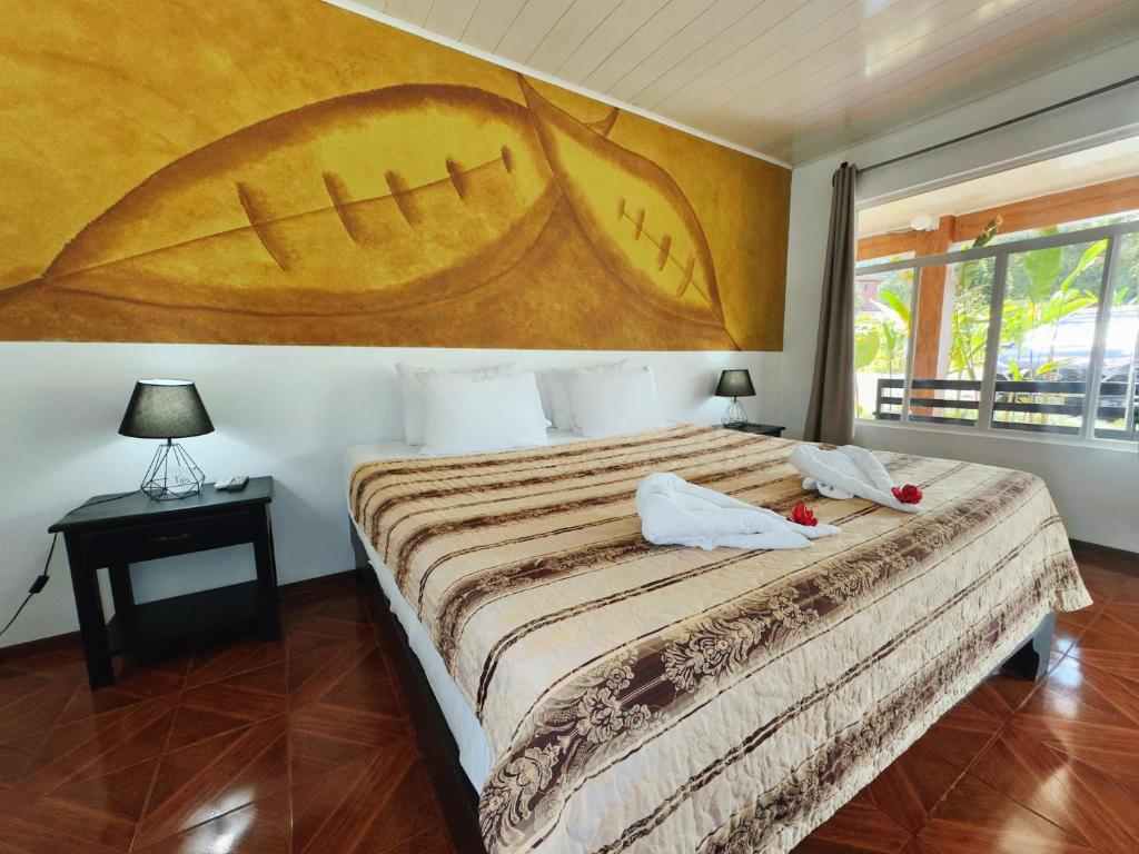 Postel nebo postele na pokoji v ubytování Hotel Dorado Hot Springs