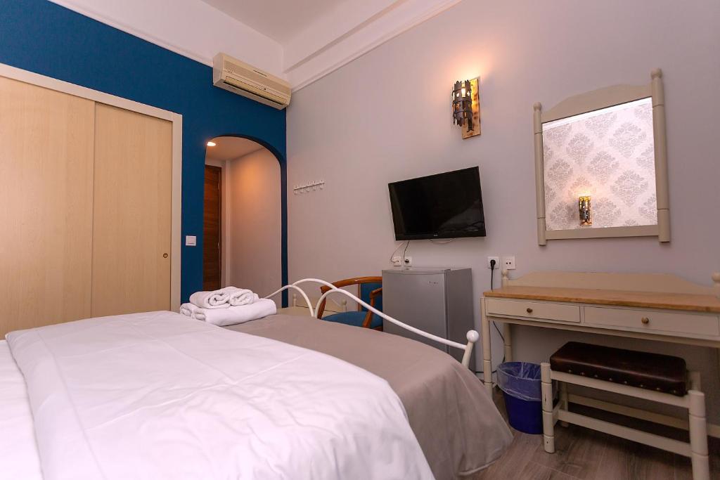 TV a/nebo společenská místnost v ubytování Hotel Kosmopolit