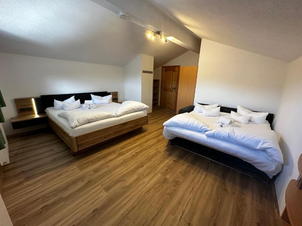 Postel nebo postele na pokoji v ubytování Deluxe Apart Bader