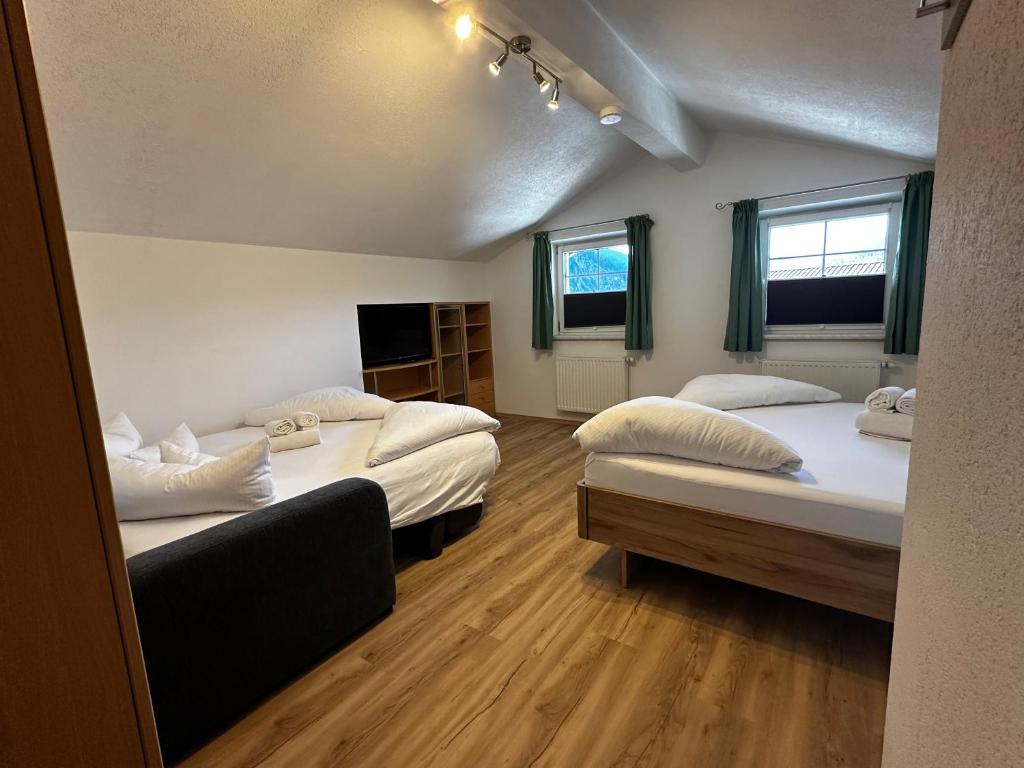 Postel nebo postele na pokoji v ubytování Deluxe Apart Bader