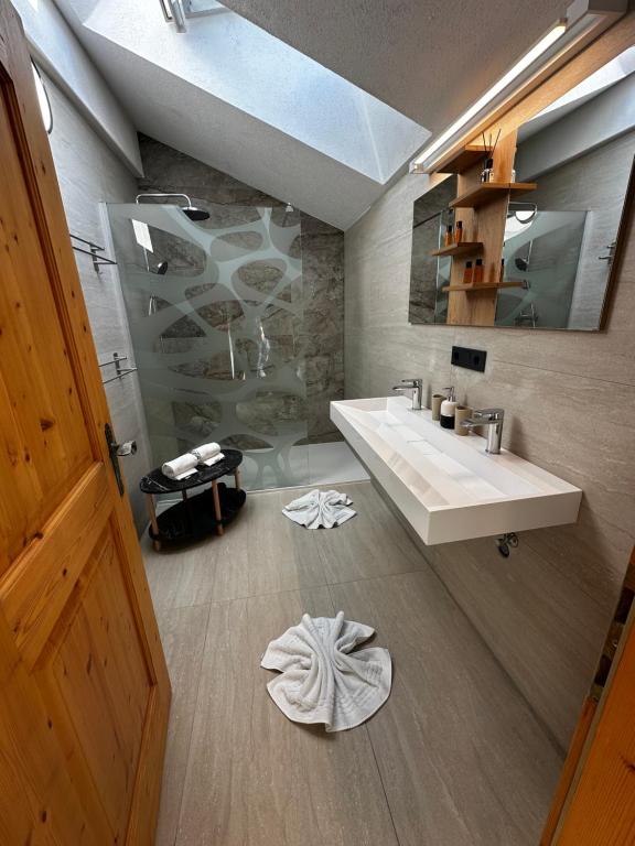 Koupelna v ubytování Deluxe Apart Bader