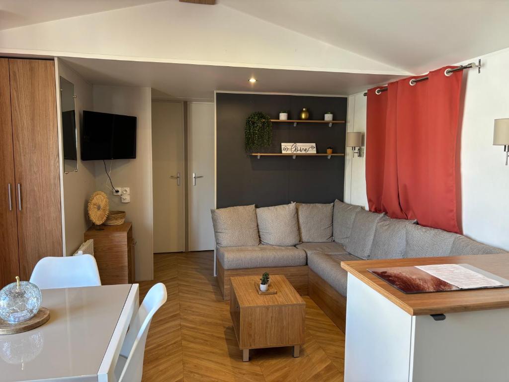 TV a/nebo společenská místnost v ubytování M H 3 Chambres