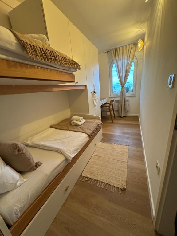 Postel nebo postele na pokoji v ubytování Villa Nada