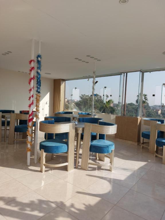 Restoran või mõni muu söögikoht majutusasutuses Regent Pyramids View