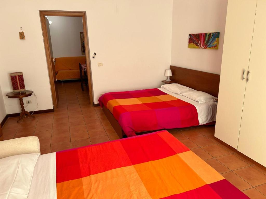 Postel nebo postele na pokoji v ubytování Casa Mare San Vito Lo Capo