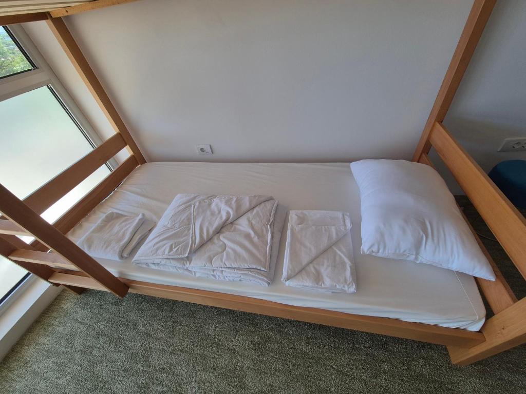 Postel nebo postele na pokoji v ubytování AdriaMont - Rooms & Coworking