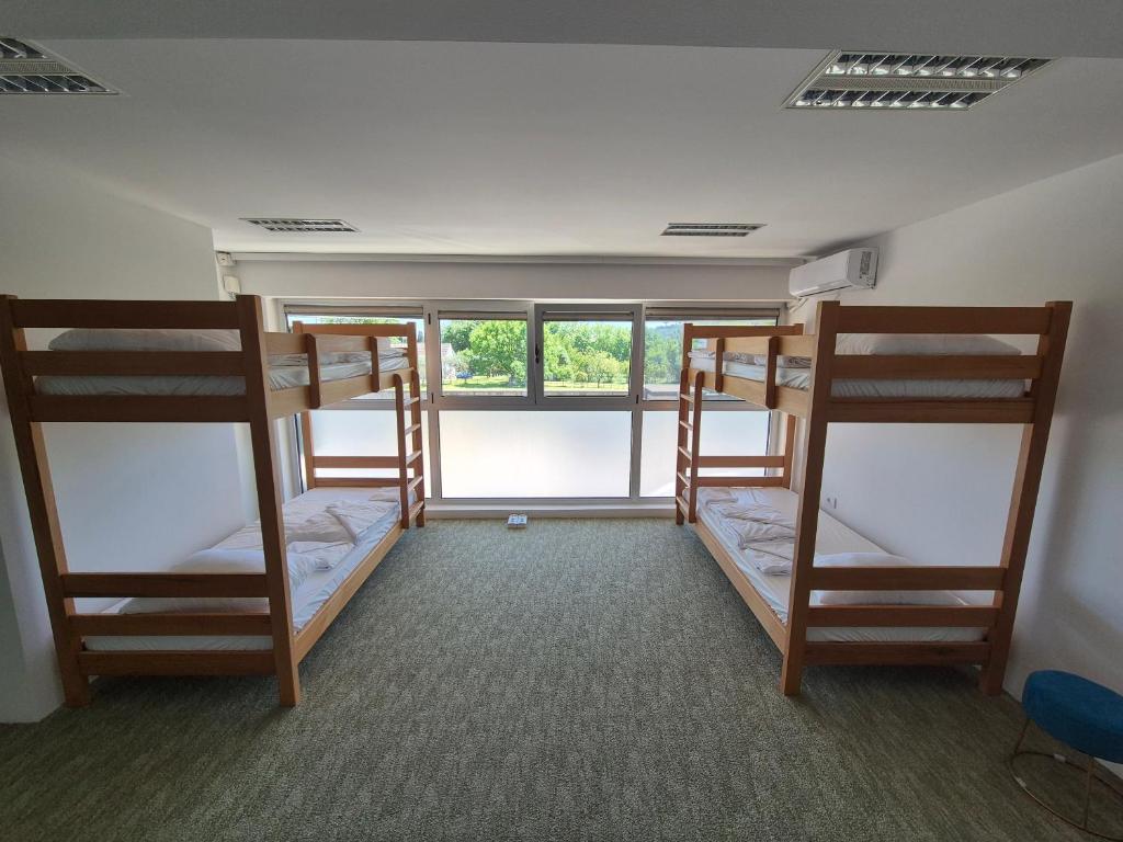 Postel nebo postele na pokoji v ubytování AdriaMont - Rooms & Coworking