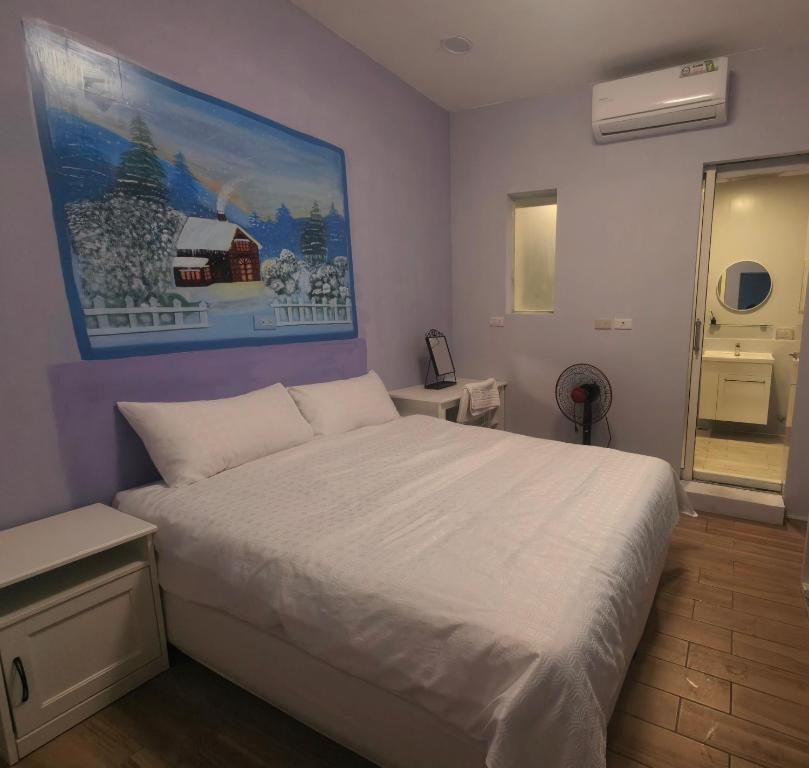 Postel nebo postele na pokoji v ubytování Xinyuanbao Shangshi Homestay