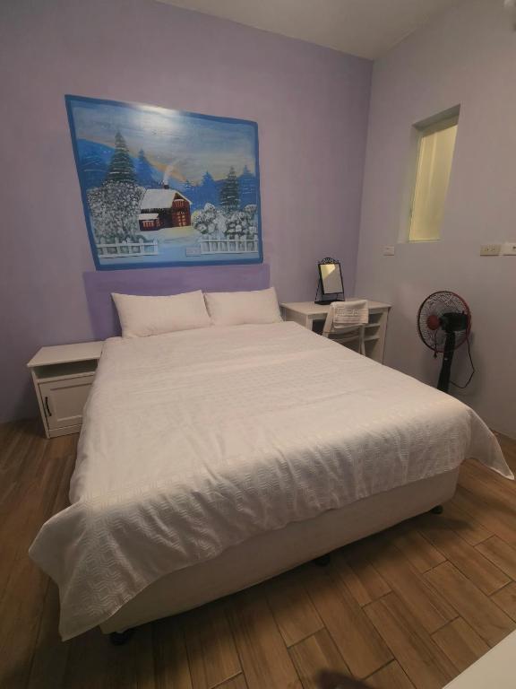 Postel nebo postele na pokoji v ubytování Xinyuanbao Shangshi Homestay