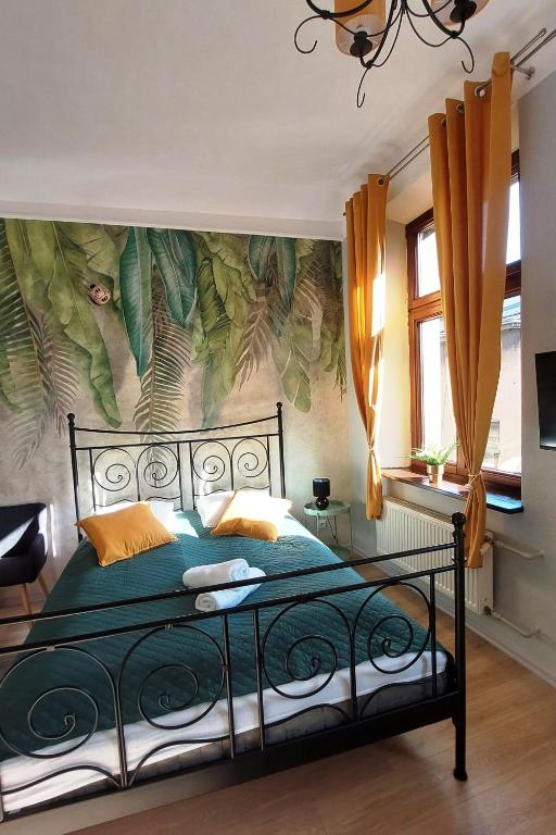 Posteľ alebo postele v izbe v ubytovaní Cozy Old Town Apartments