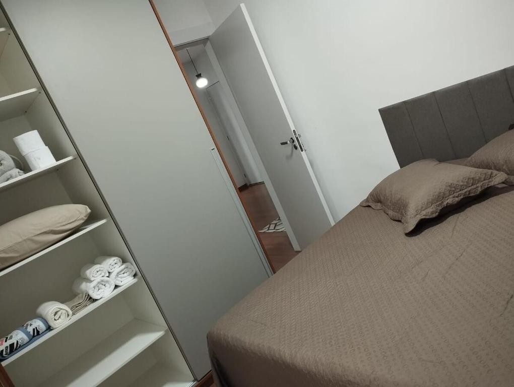 Postel nebo postele na pokoji v ubytování Rose Prime Loft