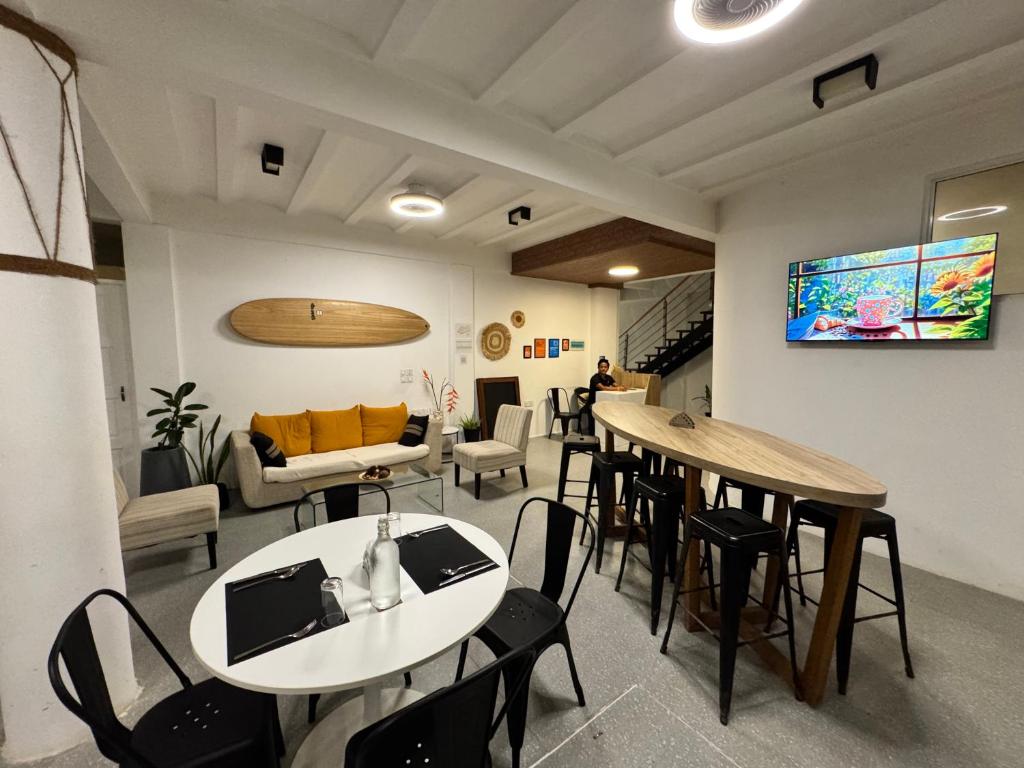 TV a/nebo společenská místnost v ubytování Si! Coral Inn