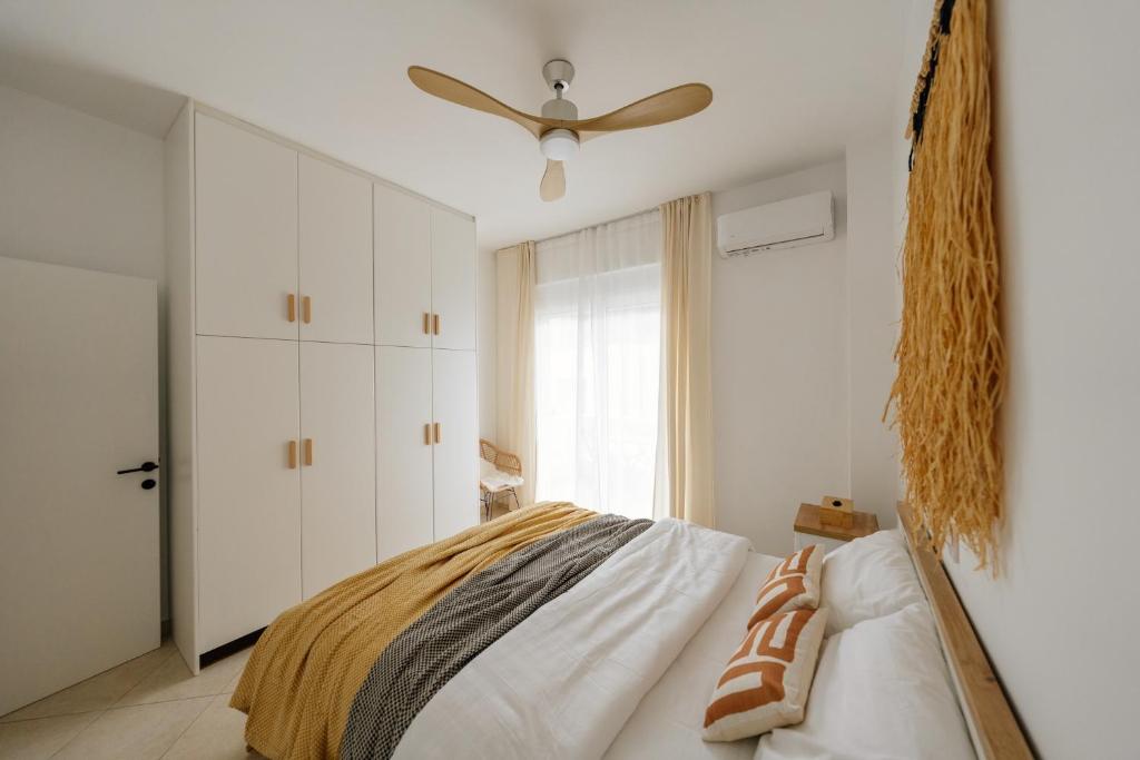 Postel nebo postele na pokoji v ubytování El Chacha Apartment