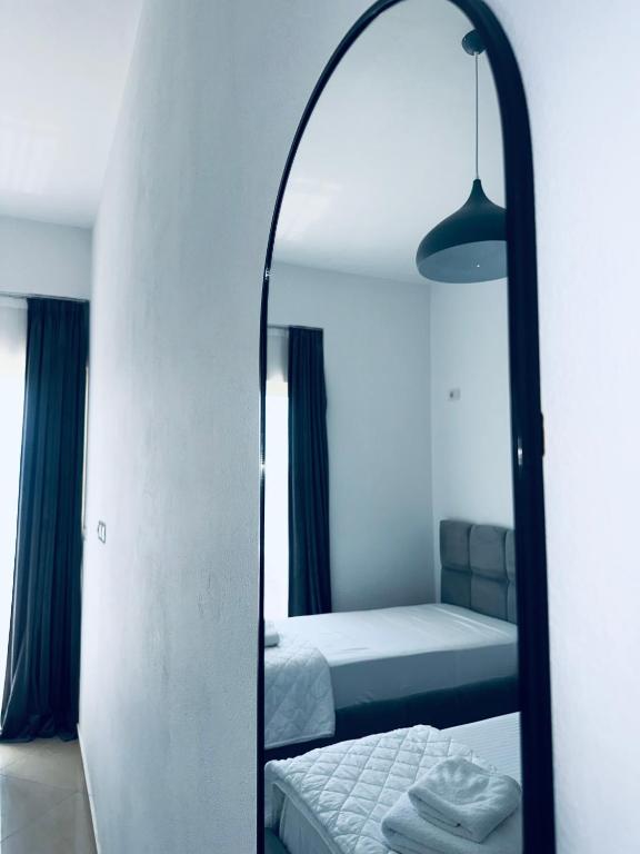 Postel nebo postele na pokoji v ubytování Hotel Mane