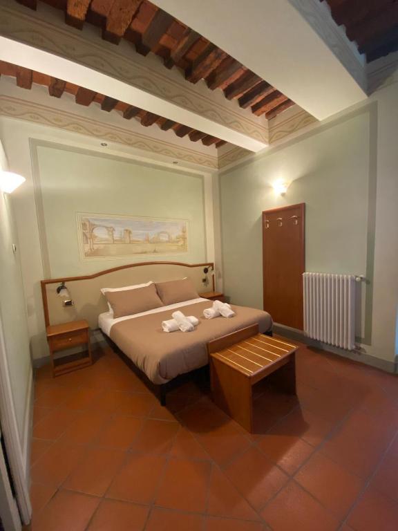 Postel nebo postele na pokoji v ubytování Le Sette Lune Rooms