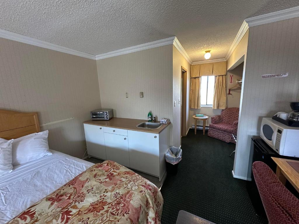 Postel nebo postele na pokoji v ubytování Stagecoach Inn