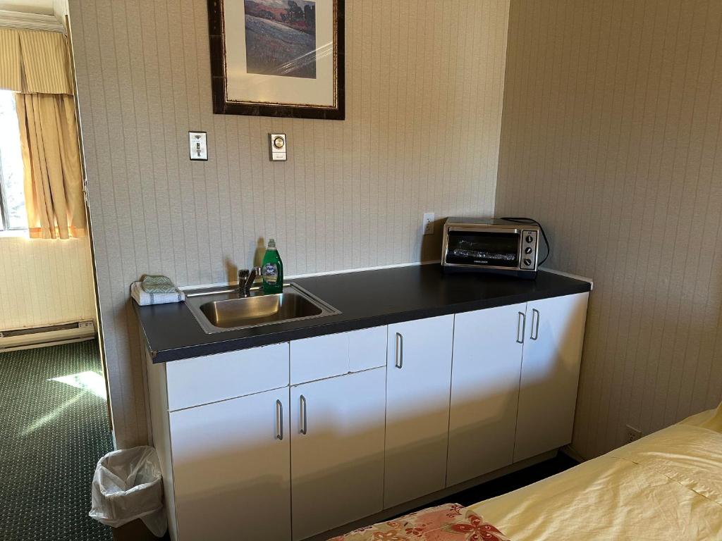 Postel nebo postele na pokoji v ubytování Stagecoach Inn