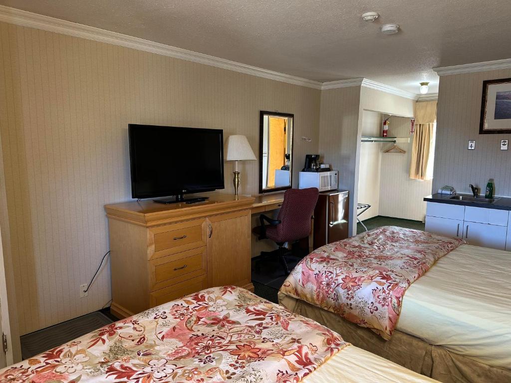 Postel nebo postele na pokoji v ubytování Stagecoach Inn