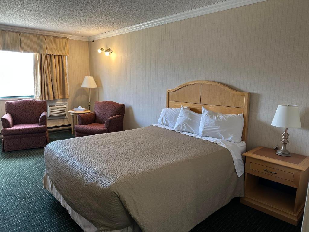 Postel nebo postele na pokoji v ubytování Stagecoach Inn