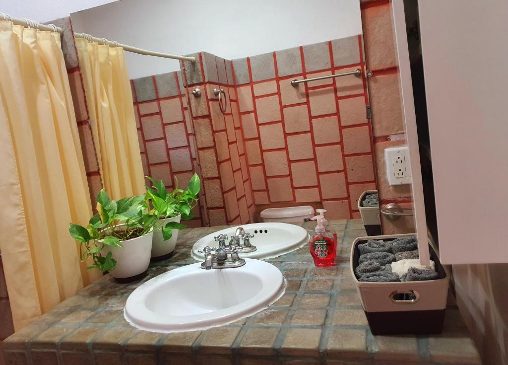 Ванная комната в Casa Colorida