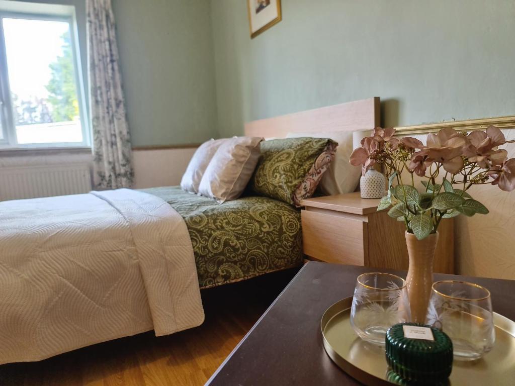 Voodi või voodid majutusasutuse Guest Lodge toas
