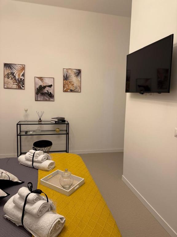 TV a/nebo společenská místnost v ubytování MARIANTONIA Apartment And Rooms