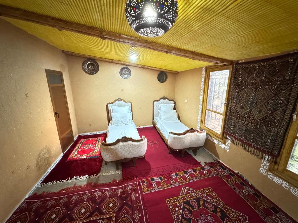 Posezení v ubytování Villa privée réservée aux familles