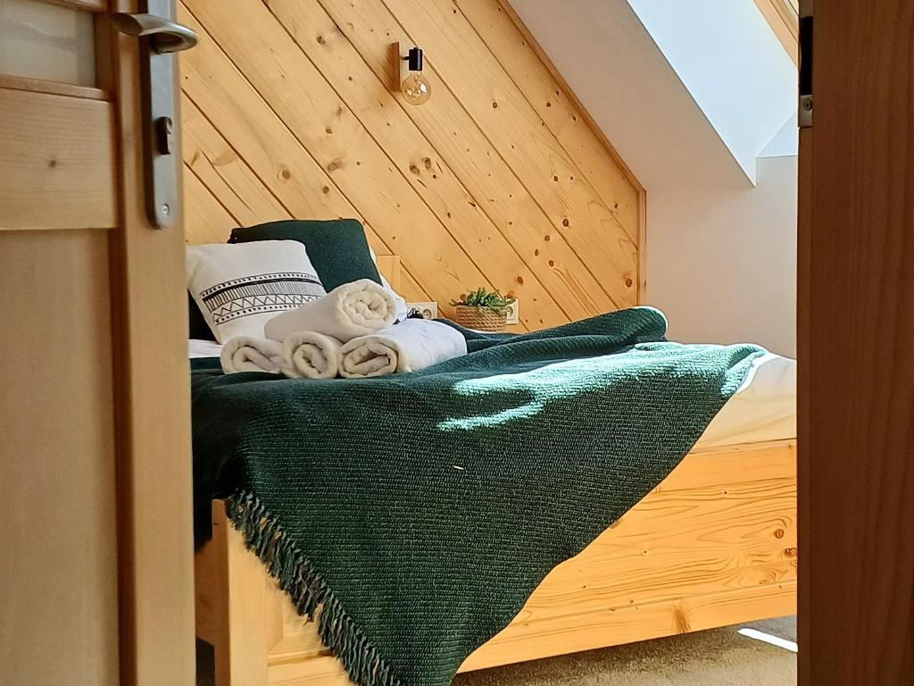 Posteľ alebo postele v izbe v ubytovaní Tatra Apartament