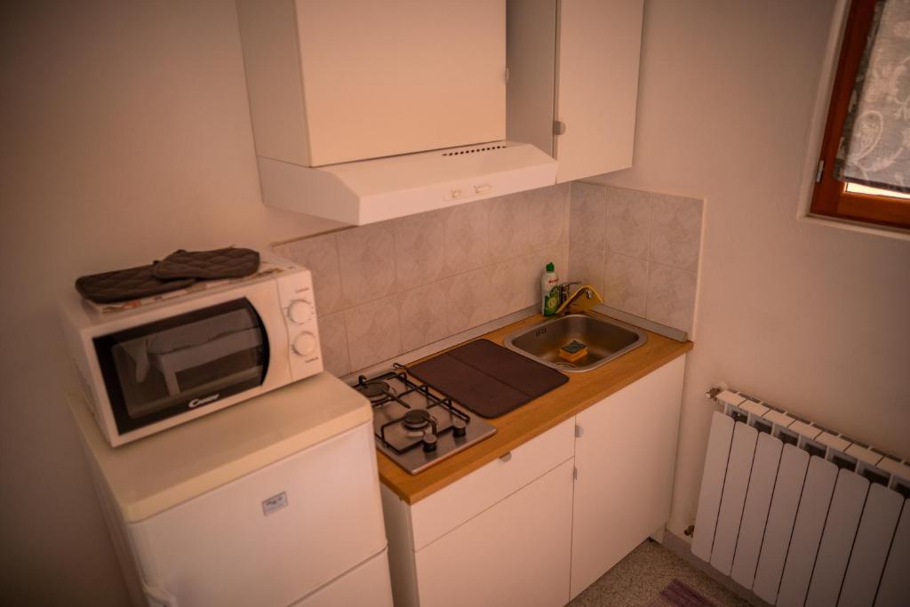 Kuchyň nebo kuchyňský kout v ubytování L'ulivo