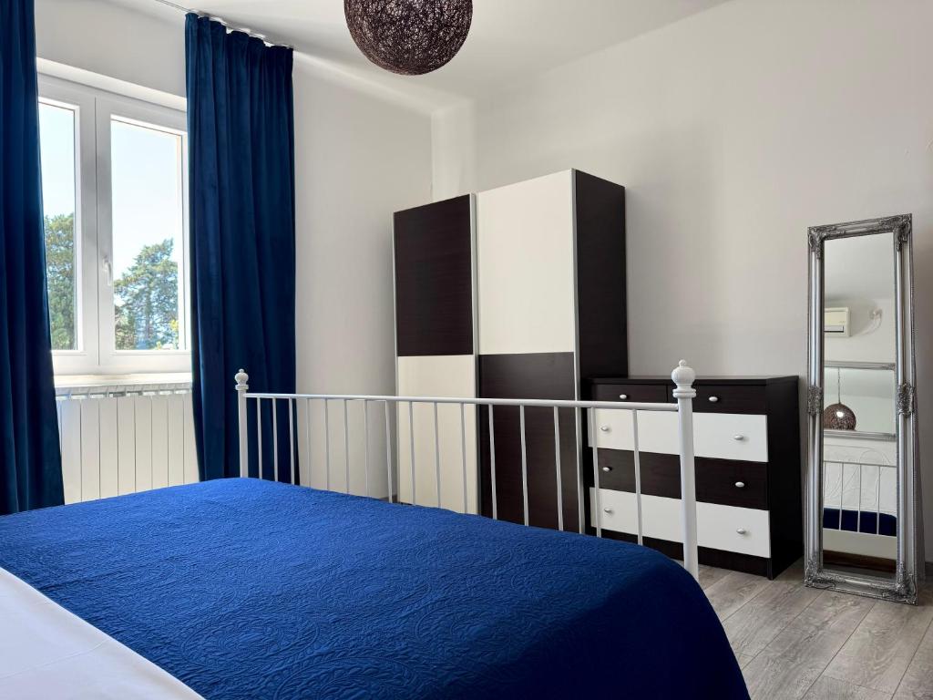 Posteľ alebo postele v izbe v ubytovaní Holiday Home Lungo Mare