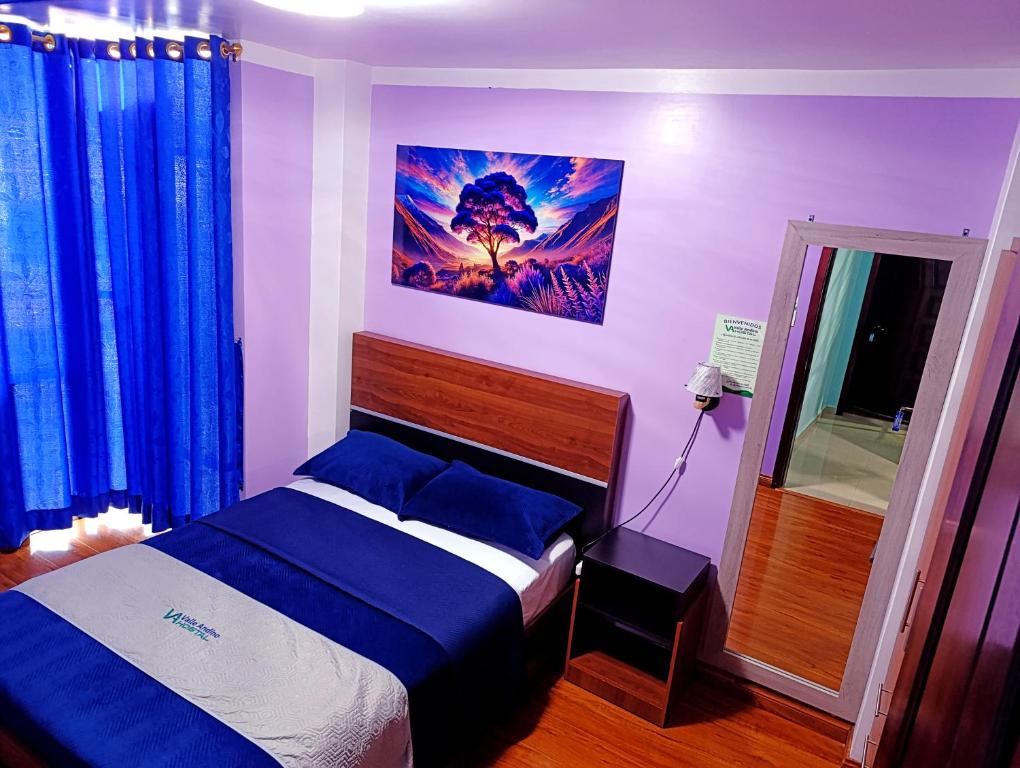 Postel nebo postele na pokoji v ubytování Hostal Valle Andino