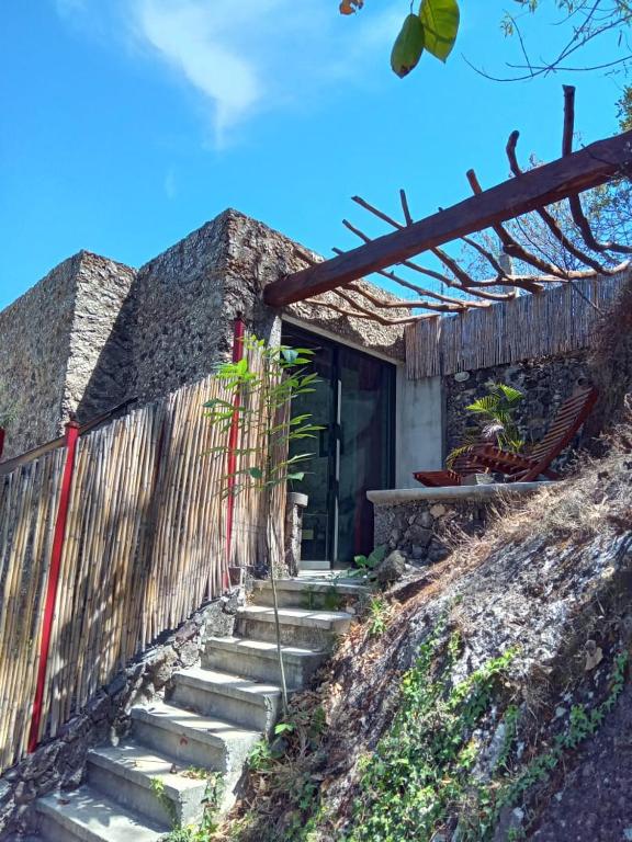 a set of stairs leading up to a house at Tecuán-Calli in Tepoztlán