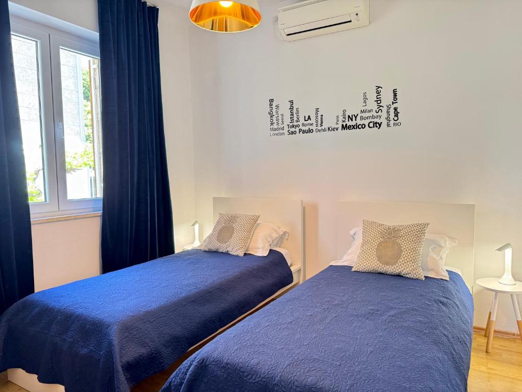 Posteľ alebo postele v izbe v ubytovaní Holiday Home Lungo Mare