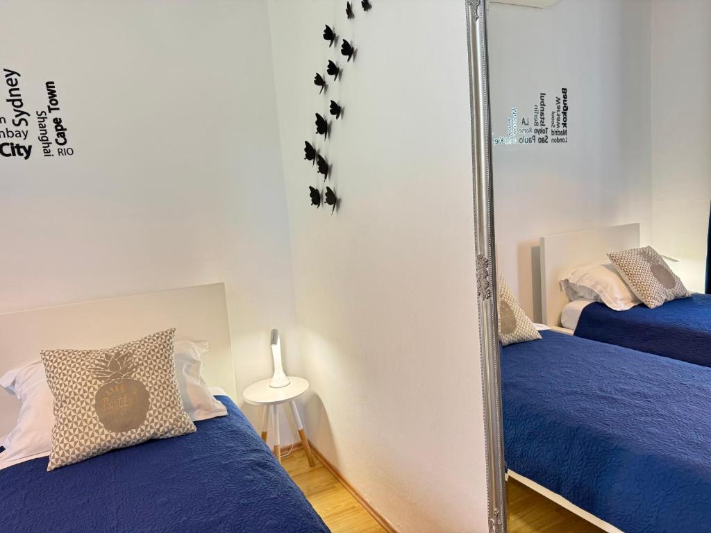 Posteľ alebo postele v izbe v ubytovaní Holiday Home Lungo Mare