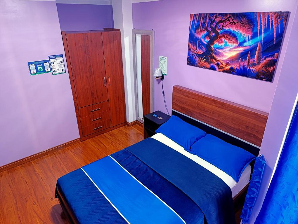 Postel nebo postele na pokoji v ubytování Hostal Valle Andino