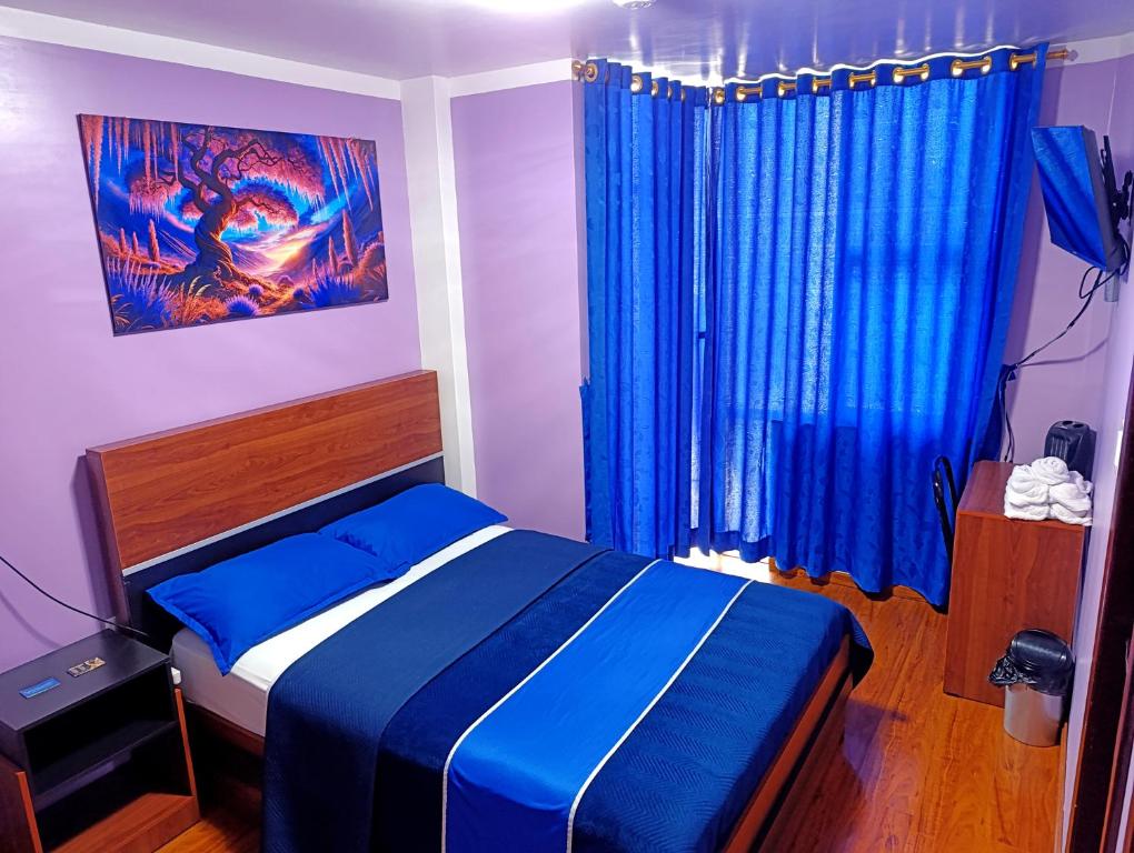 Postel nebo postele na pokoji v ubytování Hostal Valle Andino