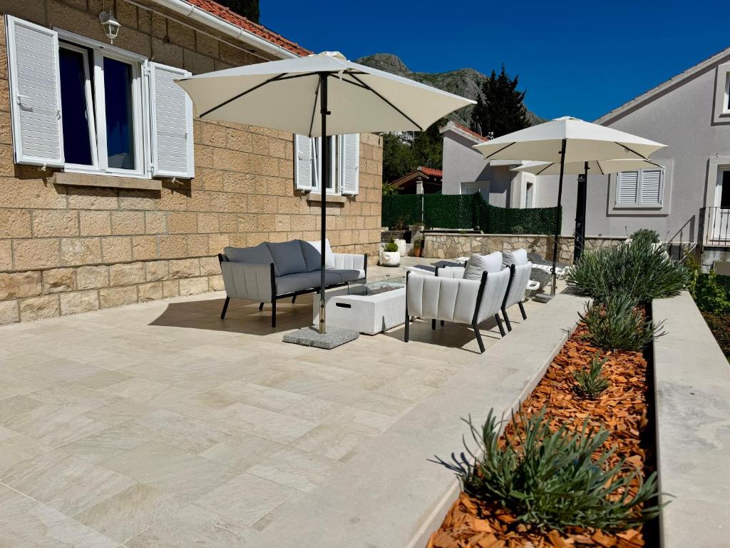 Patio alebo iná vonkajšia časť ubytovania Holiday Home Lungo Mare