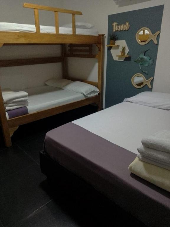 Postel nebo postele na pokoji v ubytování Cabaña en coveñas en acogedor conjunto residencial