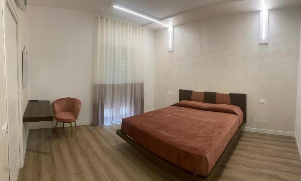 Postel nebo postele na pokoji v ubytování LD Ianuzziello Residence - BB