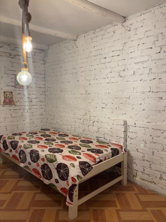 En eller flere senge i et værelse på Casa de Campo Mamaia